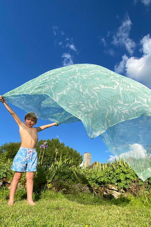 Ultra light-weight chiffon silk scarf in green & white Protea print by designer Lotty B Mustique