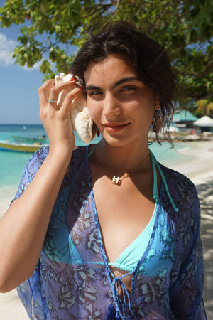 Silk Cosima Kaftan: FLAMBOYANT FLOWER - BLUE, designer Lotty B Mustique beach life shell listening