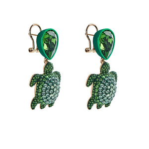 Drop earrings - Swarovski Crystal in Shining Green; green lacquer; pale gold plating; brass; pierced clip back closure; designed by Catherine Prevost for Atelier Swarovski