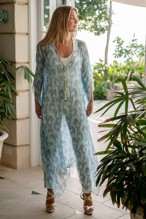 Designer vacation fashion 3/4 length silk chiffon kaftan cover up in pale blue Lurcher print by Lotty B Mustique