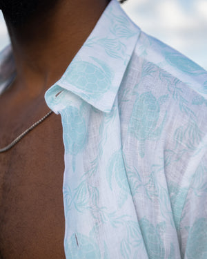 Men's linen shirt quality and detail in aqua blue Turtle print by designer Lotty B Mustique