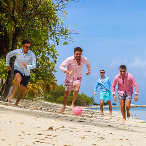 Mens designer swim wear Guava red print by Lotty B Mustique beach football