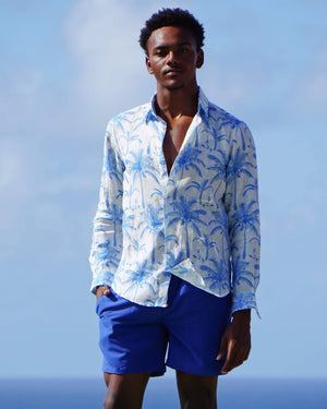Mens linen vacation shirt tropical palm print in white and blue by Lotty B Mustique