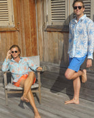 Designer linen shirts tropical palm print in white and blue by Lotty B Mustique