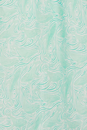 Linen swatch: Whale turquoise print by Lotty B for Pink House Mustique