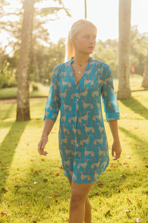 Tropical beach style short flared dress in pure silk Lurcher green blue print designer Lotty B Mustique