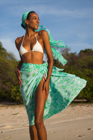 A Lotty B chiffon silk sarong can be styled as a scarf, hat band or fold and tie over a bikini as a bandeau top or skirt