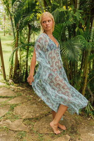 Floaty summer style 3/4 length silk chiffon kaftan cover up in pale blue Lurcher print by Lotty B Mustique