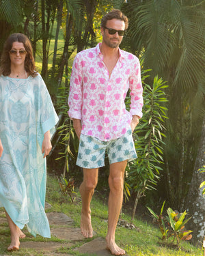 Men's linen vacation shirt in pink Turtle print by designer Lotty B Mustique
