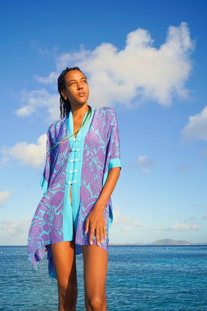 Silk holiday top in violet & turquoise Protea print designed by Lotty B Mustique
