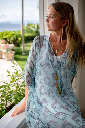 Luxury vacation style 3/4 length silk chiffon kaftan cover up in pale blue Lurcher print by Lotty B Mustique