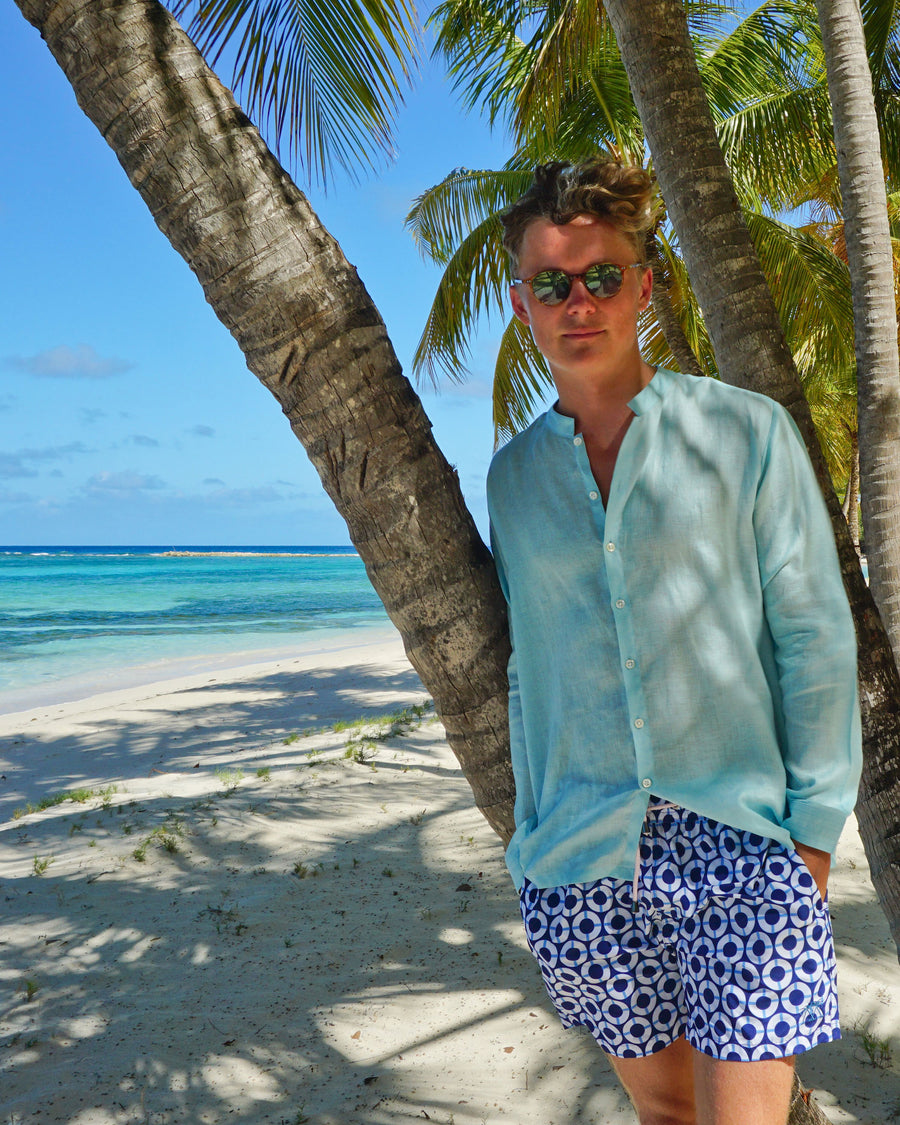 Folded Mens Collarless Linen Shirt : PALE BLUE. Designer Lotty B for Pink House Mustique. Exclusive Mens resort wear