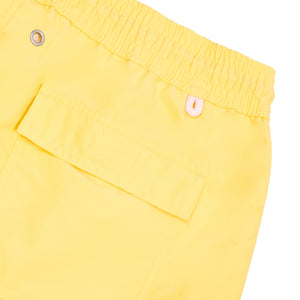 Premium yellow swim shorts for men by designer Lotty B Mustique for Pink House resortwear