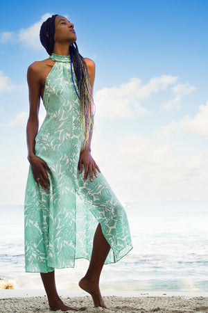 long silk wedding party dress in green Protea print by Lotty B Mustique