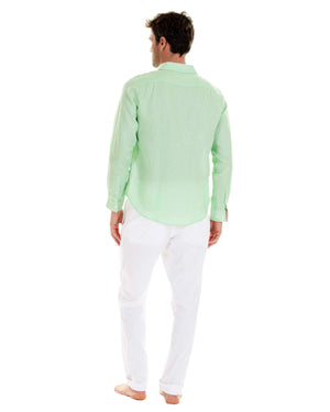 Mens green casual shirt worn with stretch linen trousers by designer Lotty B for Pink House Mustique 