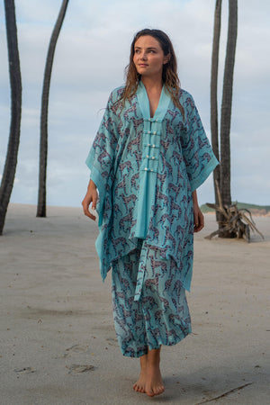 Short silk crepe Jade poncho in Lurcher aubergine pale blue and matching palazzo pants designer Lotty B
