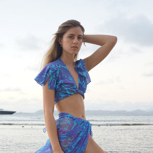 Holiday fashion silk cropped tie top in Protea violet & turquoise print by designer Lotty B Mustique