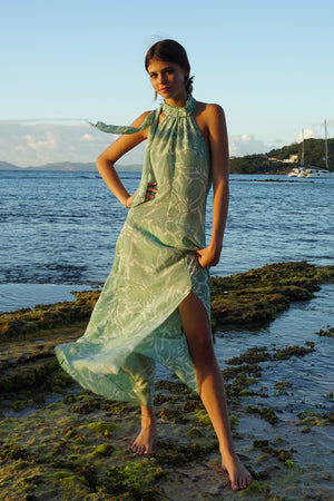 flattering long silk backless Dena dress in green Protea print by Lotty B Mustique