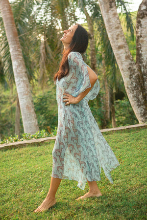 Tropical holiday wear 3/4 length silk chiffon kaftan cover up in pale blue Lurcher print by Lotty B Mustique